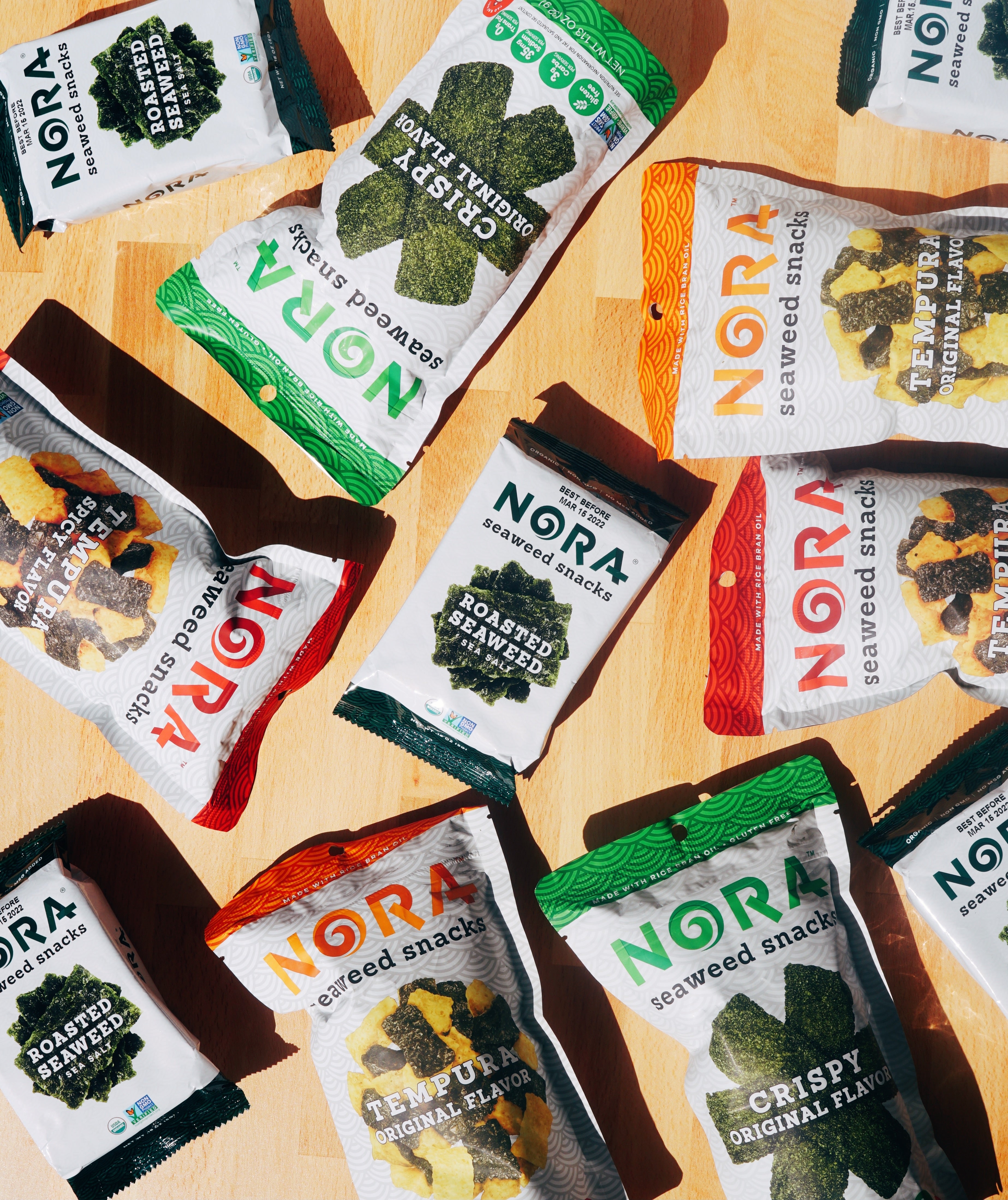 Variety of Nora Seaweed Snacks displayed on a table