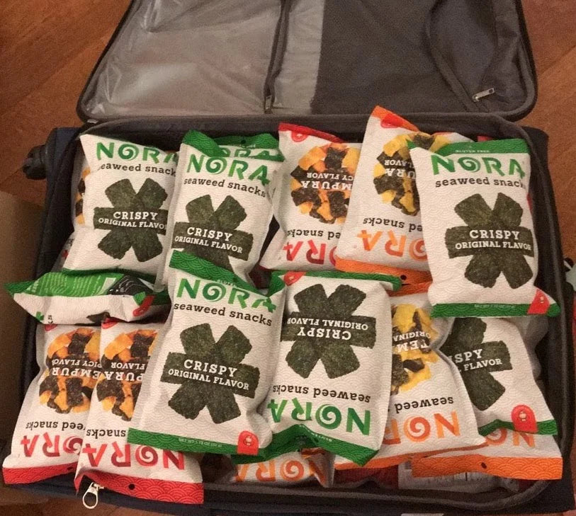 A suitcase full of Nora Seaweed Snacks