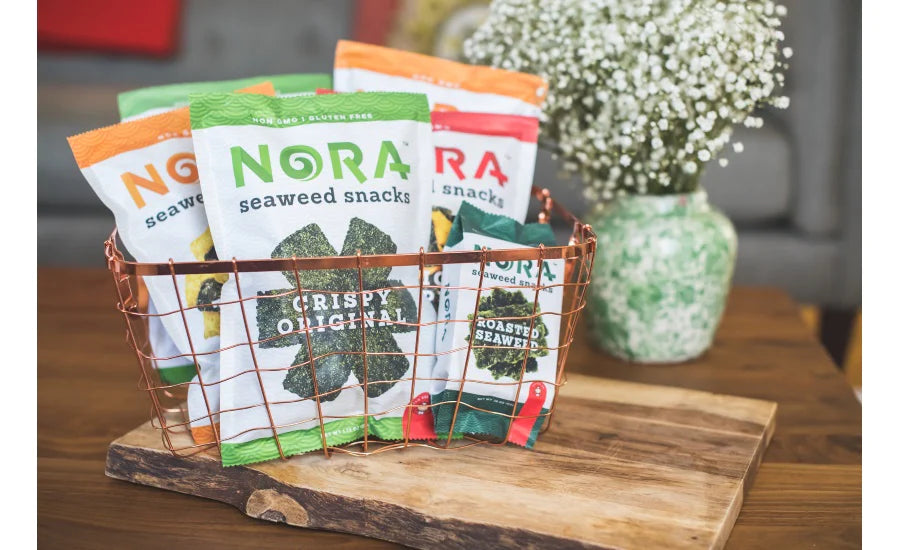 A basket holding variety of Nora Seaweed Snacks